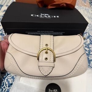 Coach Soho 25 Cream Leather Clutch with Gold Buckle